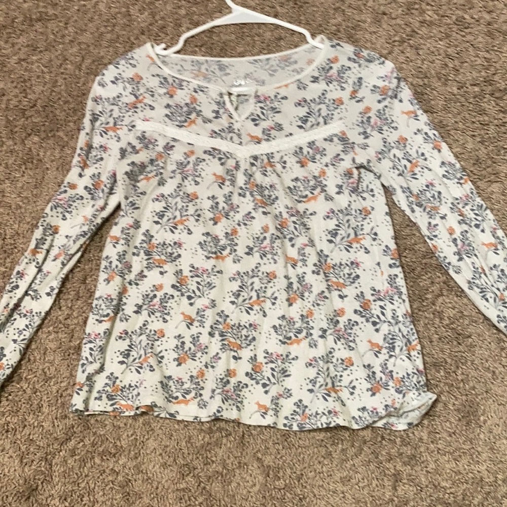 A long sleeve fancy shirt.